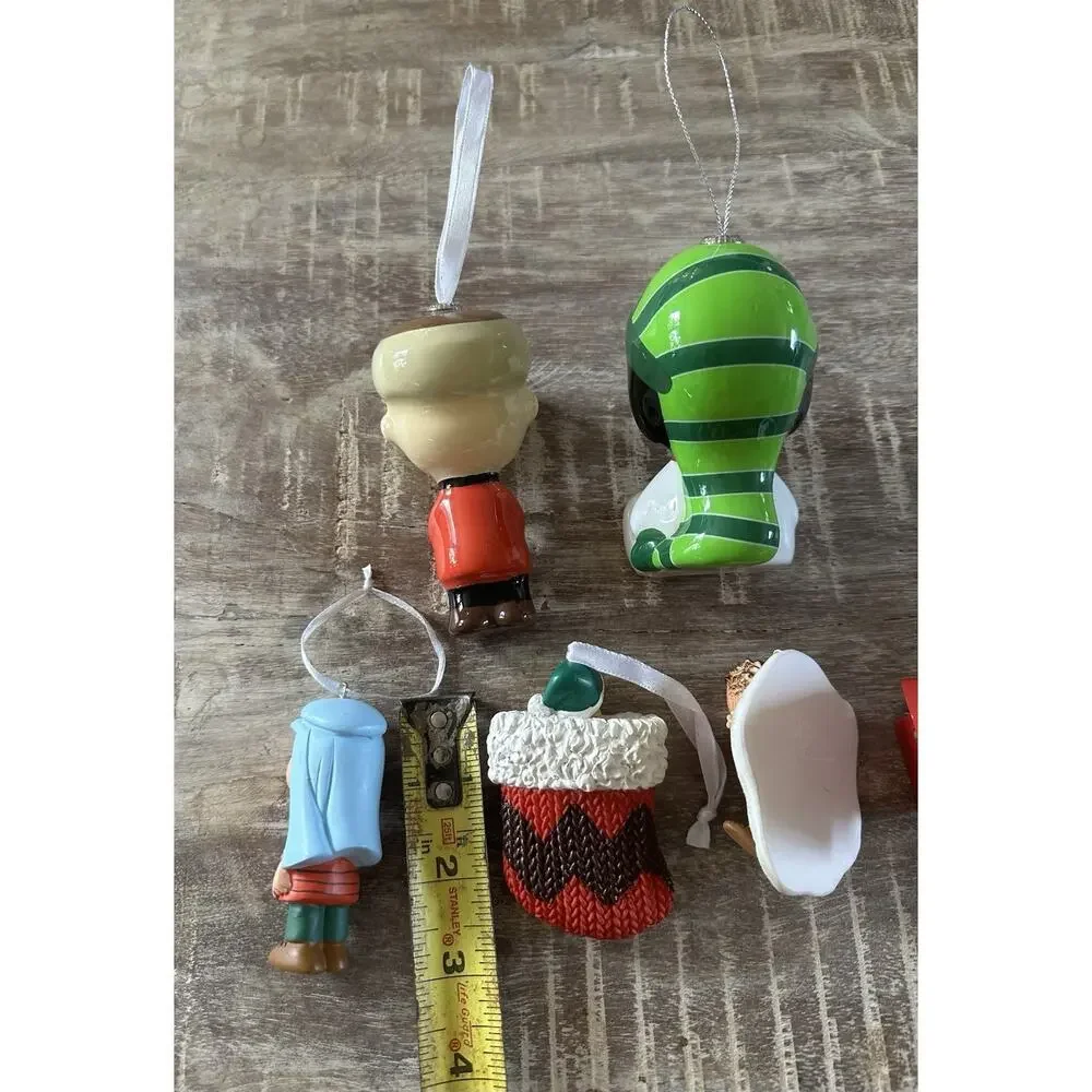 Lot 6 Hallmark Peanuts Worldwide Ornaments Snoopy Linus Etc